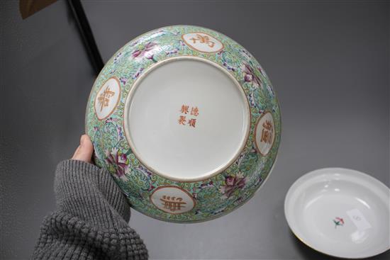 Two graduated Chinese famille rose bowls and cover, 20th century, each decorated with inscriptions and bearing red four character marks